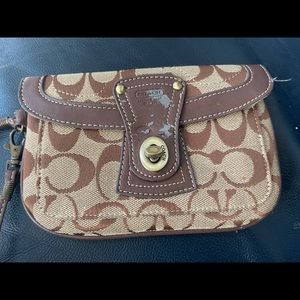Authentic VINTAGE tan coach wristlet with twist lock fair condition
